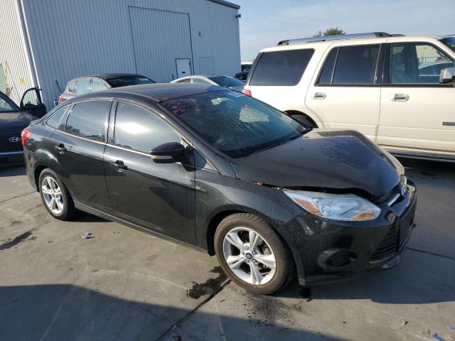 Photo 4 from auction – 2014 FORD FOCUS SE with VIN 1FADP3F27EL230556