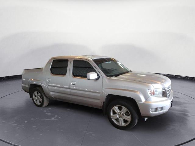 Photo 4 from auction – 2013 HONDA RIDGELINE with VIN 5FPYK1F59DB005847