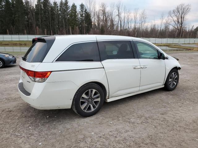 Photo 3 from auction – 2014 HONDA ODYSSEY TO with VIN 5FNRL5H92EB107784