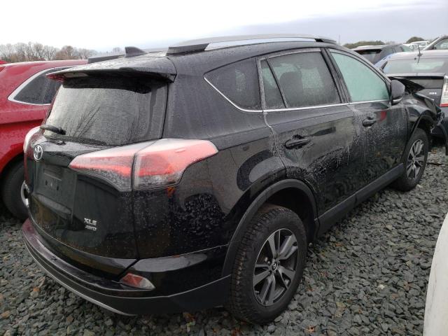 Photo 4 from auction – 2017 TOYOTA RAV4 XLE with VIN 2T3RFREVXHW581111