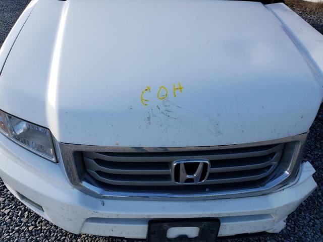 Photo 11 from auction – 2014 HONDA RIDGELINE with VIN 5FPYK1F55EB011615