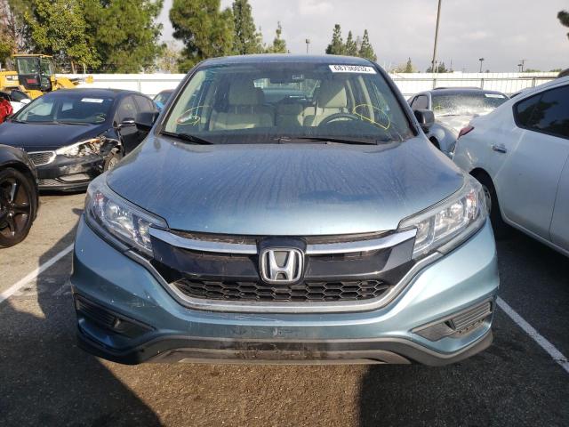 Photo 5 from auction – 2015 HONDA CR-V LX with VIN 2HKRM3H33FH556309