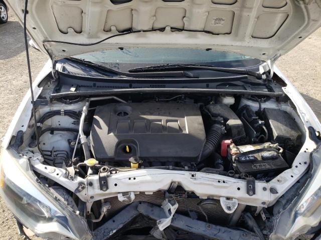Photo 11 from auction – 2014 TOYOTA COROLLA L with VIN 5YFBURHE7EP141923