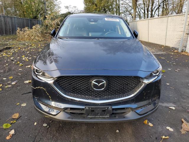 Photo 5 from auction – 2021 MAZDA CX-5 TOURI with VIN JM3KFBCM5M1427778