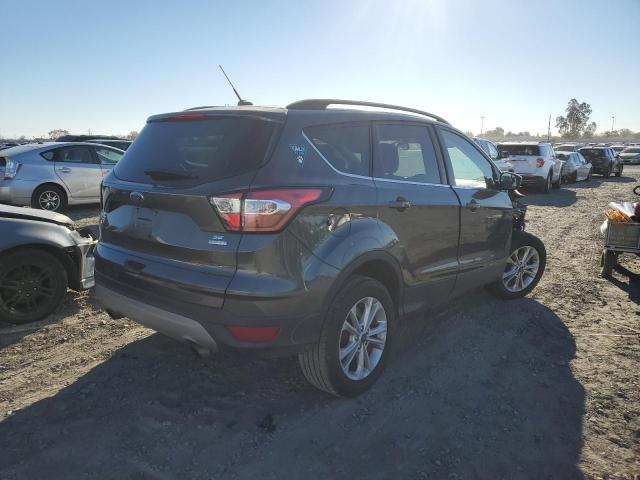 Photo 3 from auction – 2018 FORD ESCAPE SE with VIN 1FMCU0GD1JUC77093