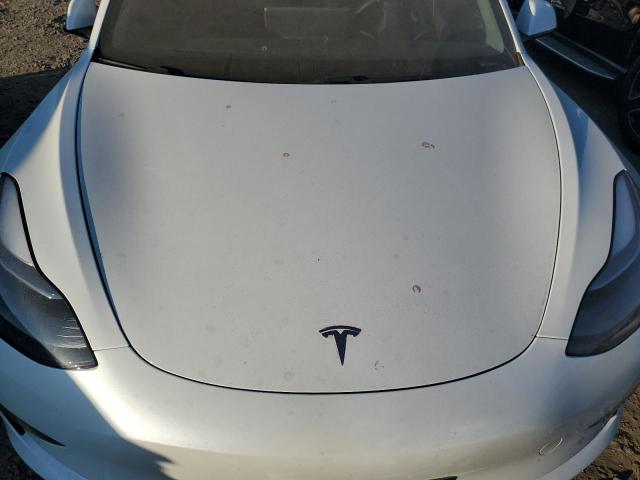 Photo 11 from auction – 2021 TESLA MODEL 3 with VIN 5YJ3E1EC5MF925632