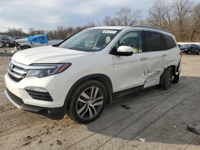 HONDA PILOT ELIT 2017 with VIN 5FNYF6H02HB102809 - Photo from auction