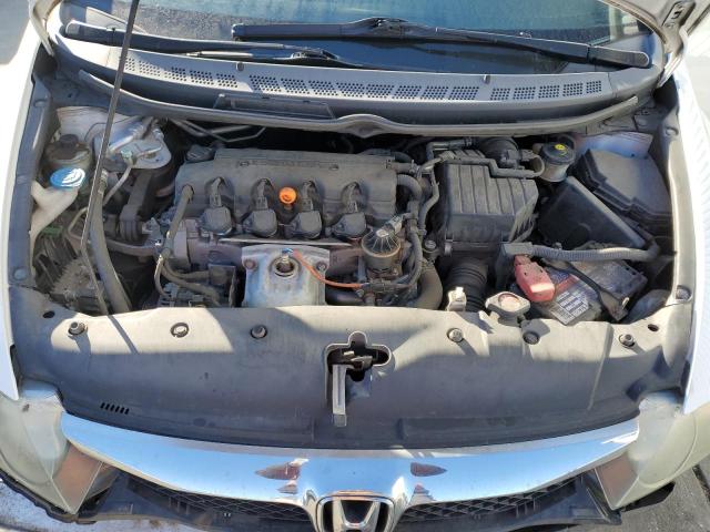 Photo 11 from auction – 2010 HONDA CIVIC LX with VIN 19XFA1F54AE004075