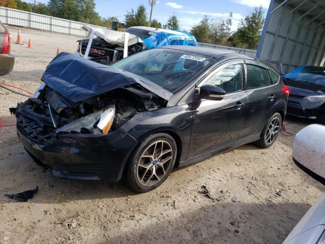 FORD FOCUS SE 2015 with VIN 1FADP3K2XFL354103 - Photo from auction