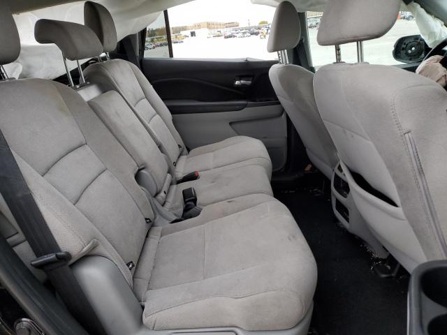 Photo 11 from auction – 2021 HONDA PILOT LX with VIN 5FNYF5H16MB007196