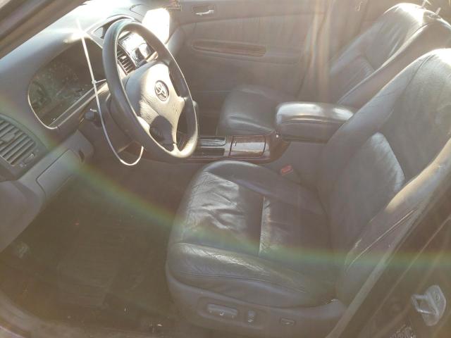 Photo 7 from auction – 2004 TOYOTA CAMRY LE with VIN 4T1BF30K74U572056