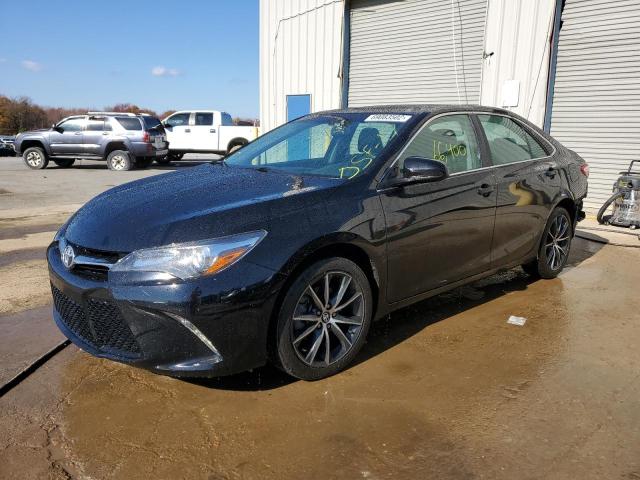 TOYOTA CAMRY LE 2017 with VIN 4T1BF1FK3HU686685 - Photo from auction