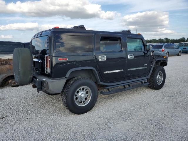 Photo 3 from auction – 2003 HUMMER H2 with VIN 5GRGN23U23H138704