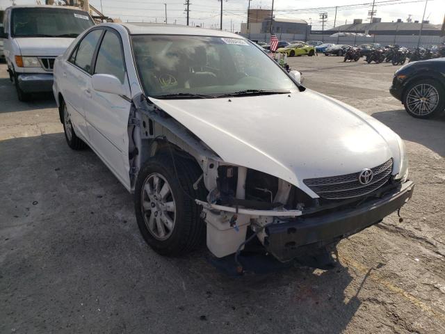 Photo 4 from auction – 2004 TOYOTA CAMRY LE with VIN 4T1BF32K34U070271