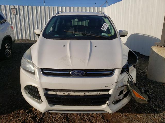 Foto 5 de la subasta – 2014 FORD ESCAPE TIT con VIN 1FMCU9JX4EUA20541