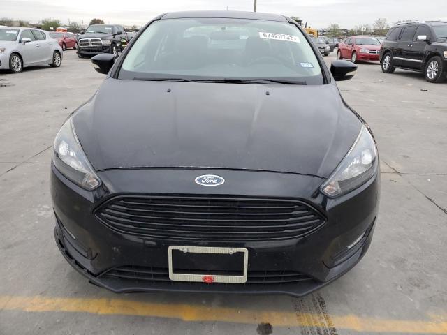 Photo 5 from auction – 2017 FORD FOCUS SE with VIN 1FADP3FE9HL307877