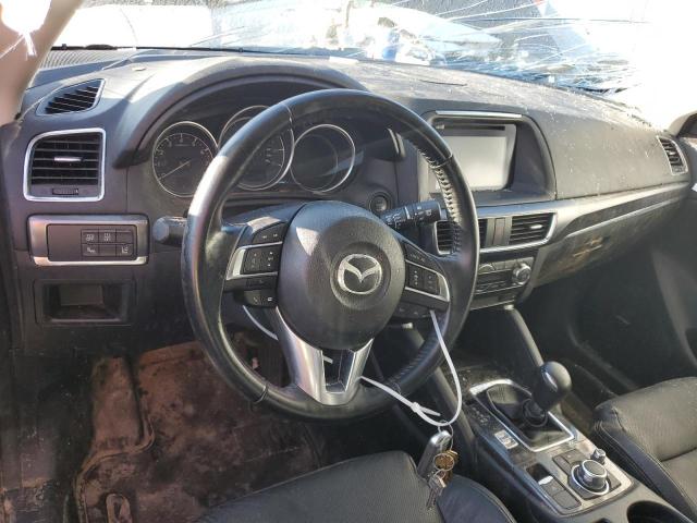 Photo 8 from auction – 2016 MAZDA CX-5 GT with VIN JM3KE2DYXG0873231