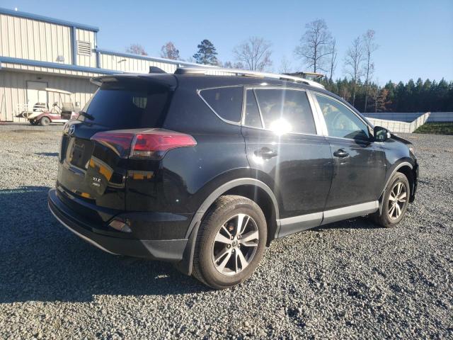Photo 3 from auction – 2016 TOYOTA RAV4 XLE with VIN 2T3RFREV2GW409587