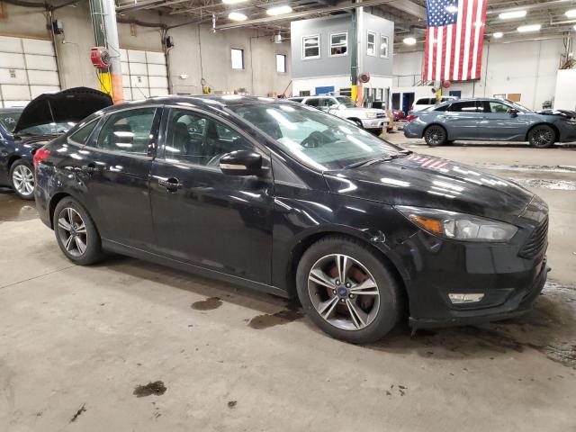 Photo 4 from auction – 2016 FORD FOCUS SE with VIN 1FADP3FE3GL306979