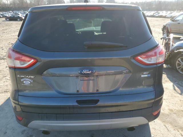 Photo 6 from auction – 2016 FORD ESCAPE SE with VIN 1FMCU9GX9GUB29636