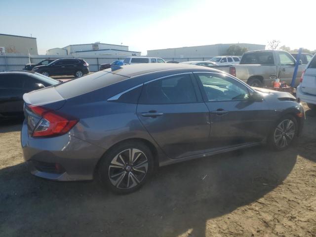 Photo 3 from auction – 2017 HONDA CIVIC EXL with VIN 2HGFC1F74HH657033