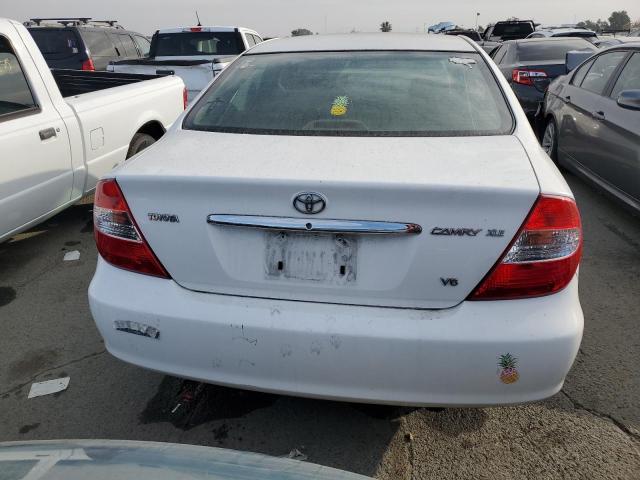 Photo 6 from auction – 2002 TOYOTA CAMRY LE with VIN JTDBF30K620030018