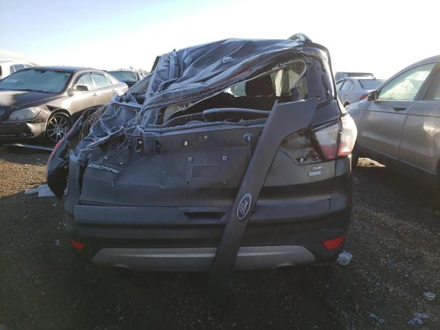 Photo 6 from auction – 2018 FORD ESCAPE SE with VIN 1FMCU9GD7JUC28856