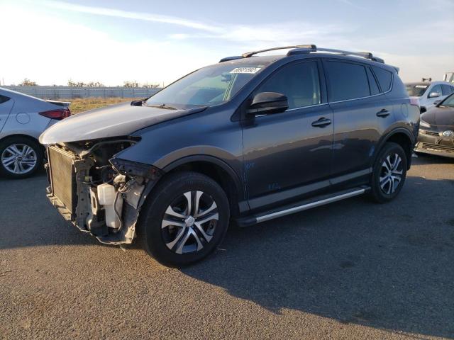 TOYOTA RAV4 LE 2017 with VIN JTMZFREV2HJ111427 - Photo from auction
