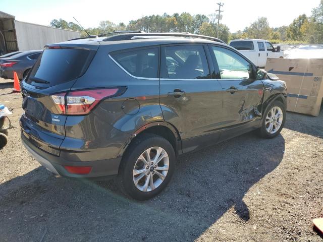 Photo 3 from auction – 2018 FORD ESCAPE SE with VIN 1FMCU0GD5JUA16761