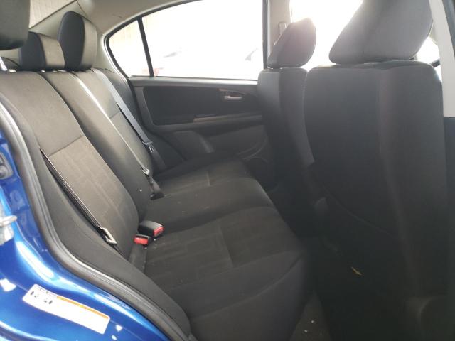 Photo 10 from auction – 2012 SUZUKI SX4 LE with VIN JS2YC5A31C6302596