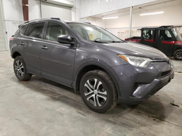 Photo 4 from auction – 2017 TOYOTA RAV4 LE with VIN JTMBFREV5HJ125789