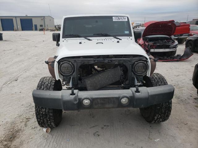 Photo 5 from auction – 2016 JEEP WRANGLER U with VIN 1C4BJWDG2GL242510