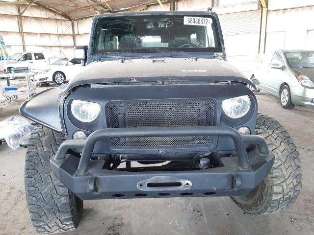 Photo 5 from auction – 2016 JEEP WRANGLER U with VIN 1C4BJWDG6GL203094