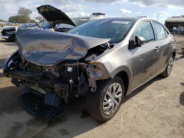 TOYOTA COROLLA L 2017 with VIN 5YFBURHE2HP717969 - Photo from auction