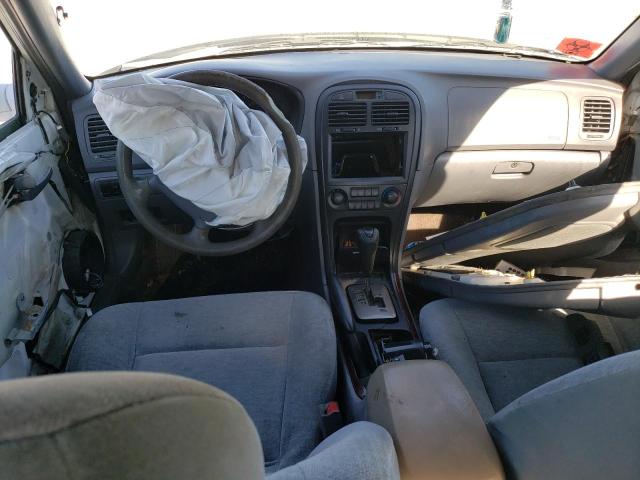 Photo 8 from auction – 2004 KIA OPTIMA LX with VIN KNAGD126745268088