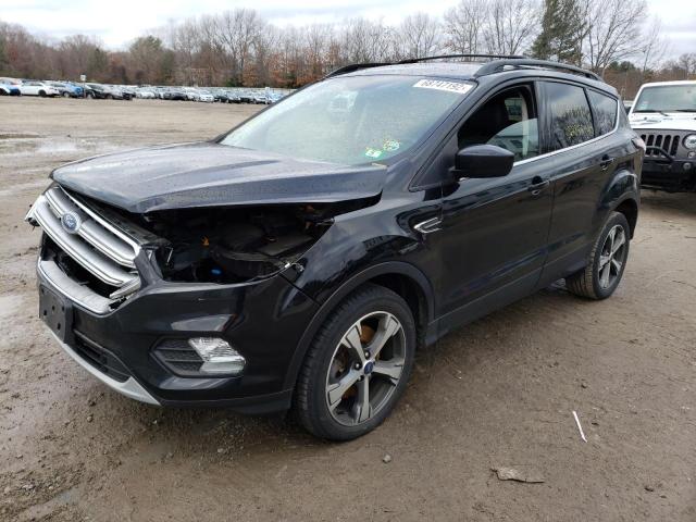 FORD ESCAPE SE 2017 with VIN 1FMCU9G91HUF00338 - Photo from auction