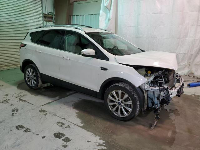 Photo 4 from auction – 2017 FORD ESCAPE TIT with VIN 1FMCU9J96HUE21563