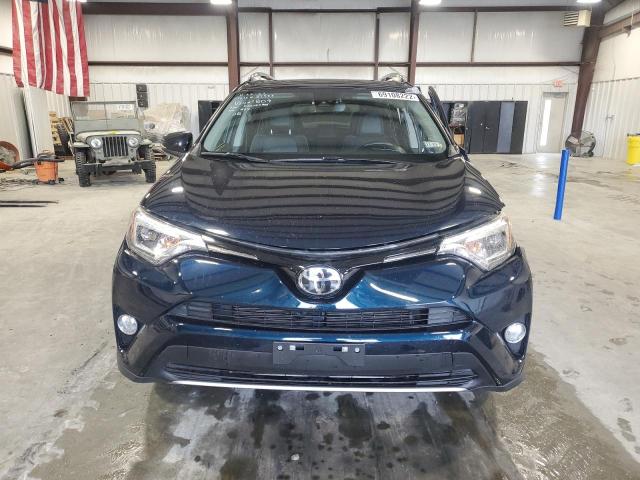 Photo 5 from auction – 2018 TOYOTA RAV4 LIMIT with VIN JTMDFREV7JJ221809