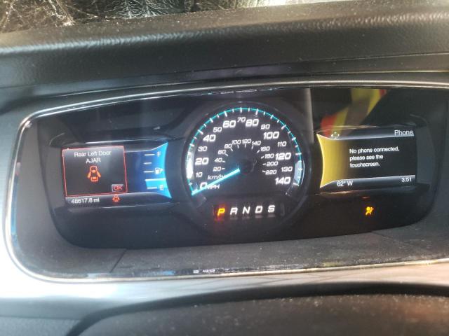 Photo 9 from auction – 2015 FORD TAURUS SEL with VIN 1FAHP2E80FG169708