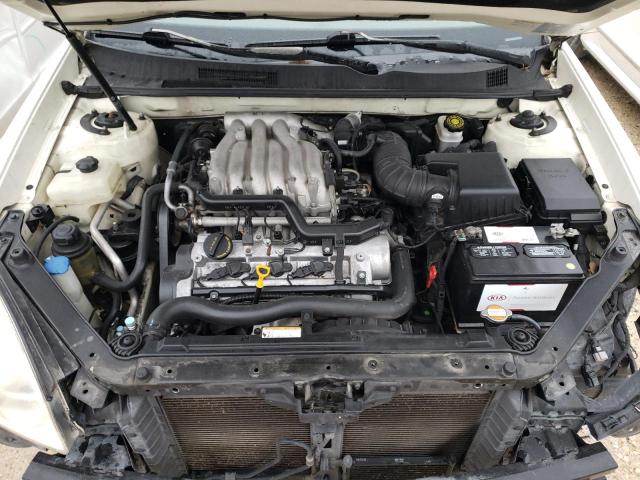 Photo 11 from auction – 2006 KIA OPTIMA LX with VIN KNAGE124865063572