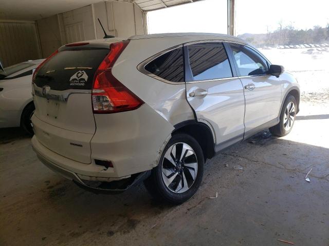 Photo 3 from auction – 2015 HONDA CR-V TOURI with VIN 5J6RM3H92FL020042
