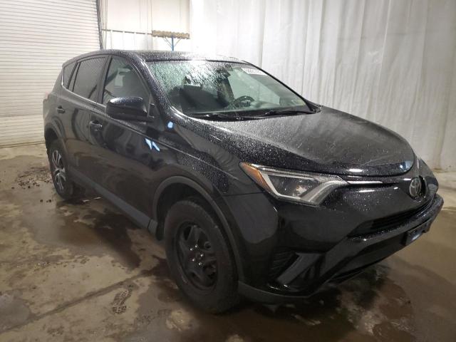 Photo 4 from auction – 2018 TOYOTA RAV4 LE with VIN 2T3ZFREV1JW506559