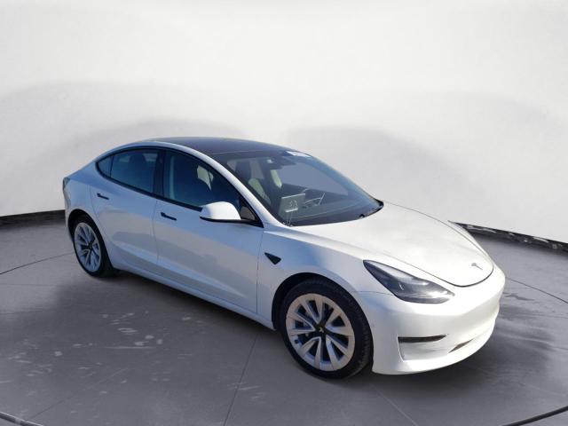 Photo 4 from auction – 2022 TESLA MODEL 3 with VIN 5YJ3E1EA0NF144971