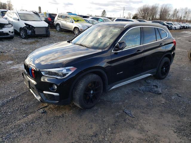 BMW X1 XDRIVE2 2017 with VIN WBXHT3C3XH5F86180 - Photo from auction