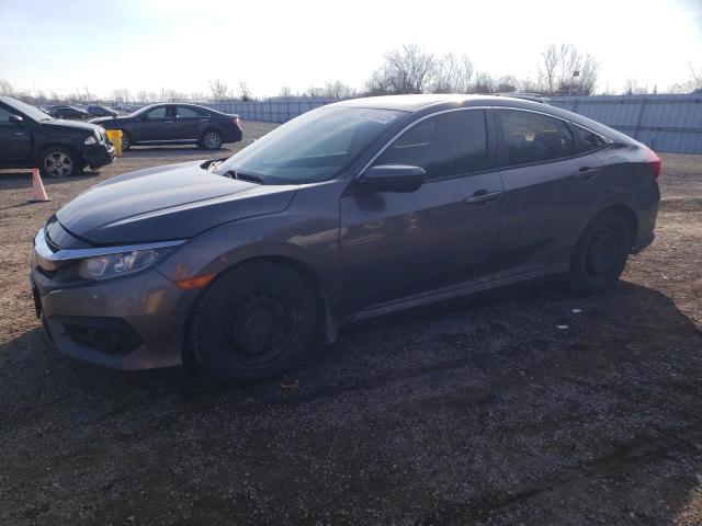Photo 1 from auction – 2016 HONDA CIVIC LX with VIN 2HGFC2E51GH012036