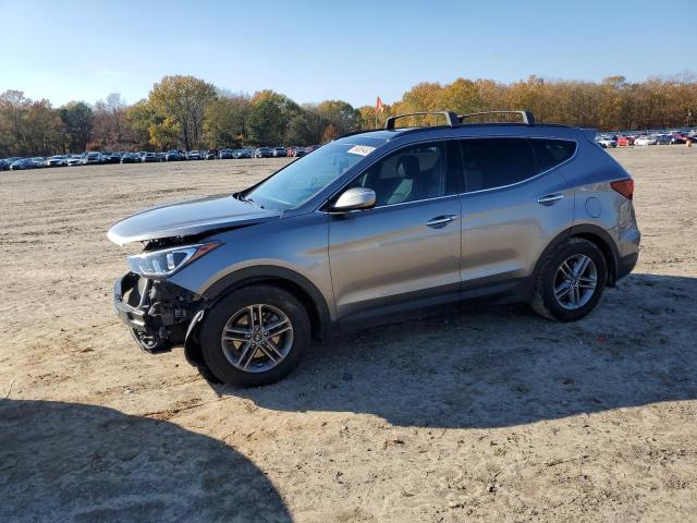 HYUNDAI SANTA FE S 2018 with VIN 5NMZU3LB2JH103562 - Photo from auction