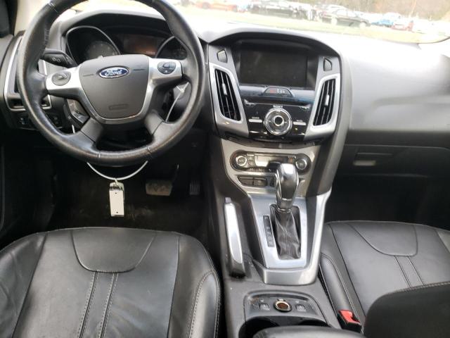 Photo 8 from auction – 2014 FORD FOCUS TITA with VIN 1FADP3J20EL114574