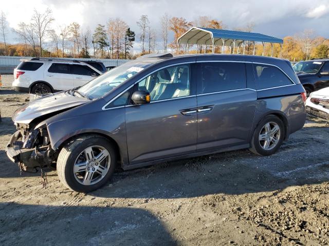 HONDA ODYSSEY TO 2012 with VIN 5FNRL5H97CB034604 - Photo from auction
