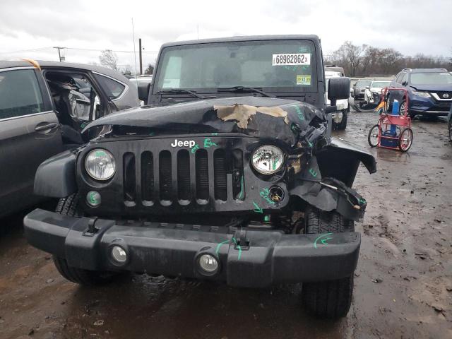Photo 5 from auction – 2015 JEEP WRANGLER U with VIN 1C4BJWDG5FL523277