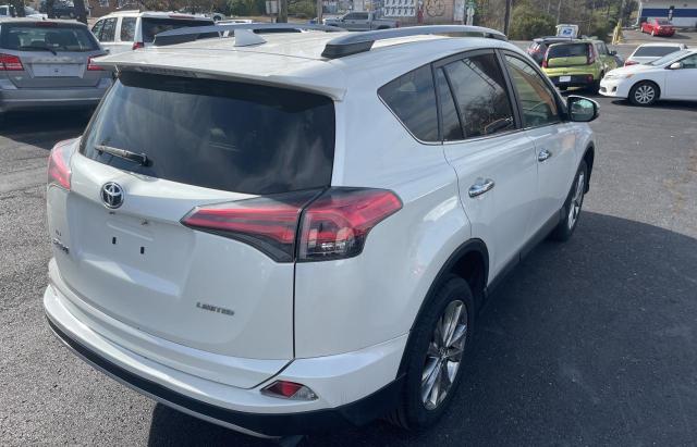 Photo 4 from auction – 2018 TOYOTA RAV4 LIMIT with VIN JTMYFREV5JD120655